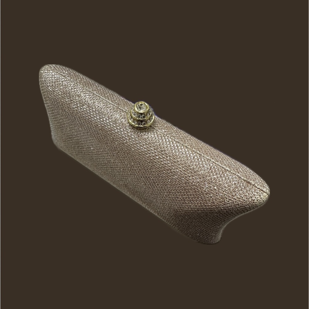 Champagne clutch with removable gold strap and gold ornamentation